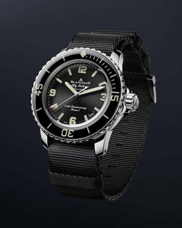 El primer lanzamiento para el aniversario del Fifty Fathom en 2023, el Fifty Fathoms 70th Anniversary Act 1 de 42 mm, retoma las características del original de 1953 y está equipado con una correa NATO YTT+ negra. Se presentó en tres series de 70 relojes, cada una dedicada a una región del mundo (EMEA, Asia-Pacífico, América), con un número del I al III en la esfera.