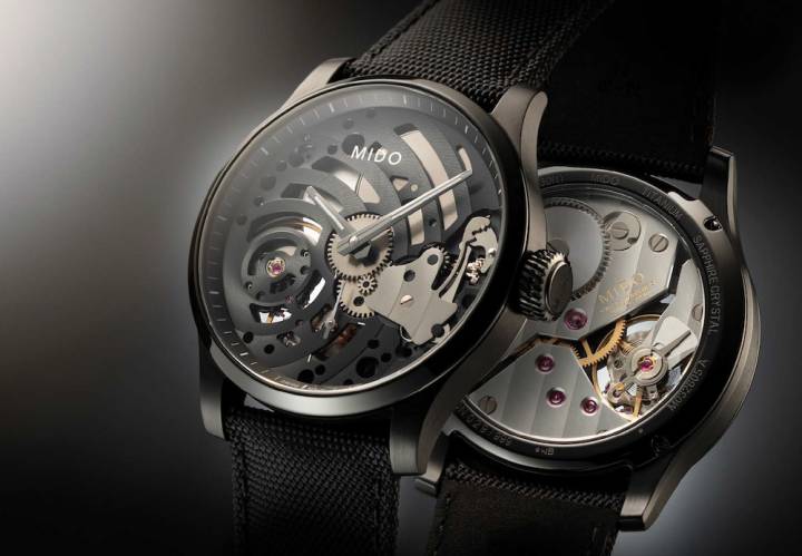 .El Multifort Mechanical Skeleton Limited Edition sin esfera, con una caja de titanio tratada con PVD negro de 44 mm de diámetro, muestra su movimiento esqueletizado (el primero para Mido) con sus agujas integradas directamente en la platina negra decorada con Côtes de Genève. Serie limitada de 999 piezas numeradas.