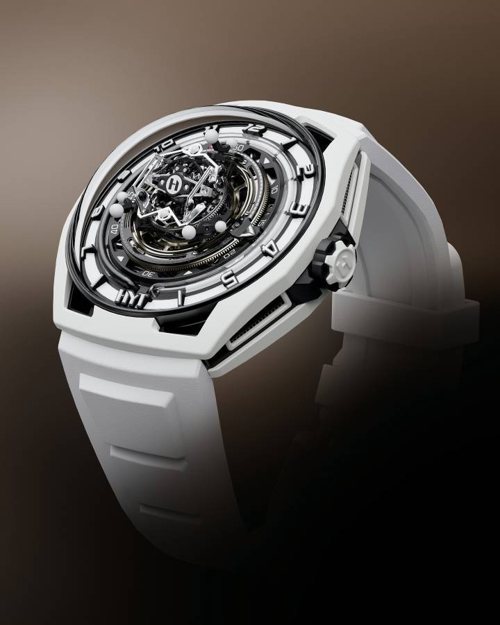 HYT Conical Tourbillon Panda (2024). El tercer tourbillon que surge de la colaboración entre HYT, con sede en Neuchâtel, y el relojero Eric Coudray de Purtec. Tres ágatas blancas, que forman parte del calibre 701TC de 533 componentes, giran a diferentes velocidades alrededor del tourbillon multieje central. Este efecto blanco sobre negro es una metáfora de la estética del Panda.