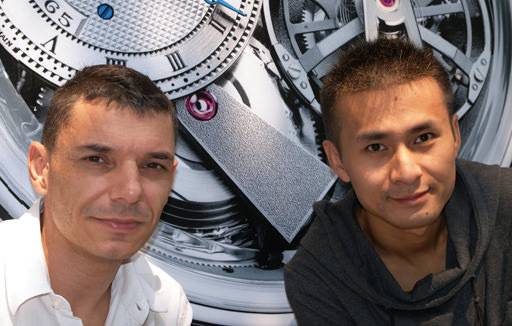 Jean-Luc Adam, derecha, y Woody Hu